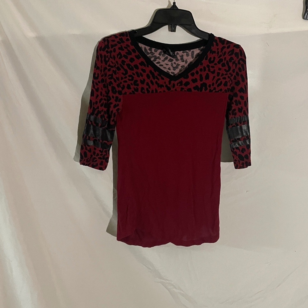 Deep red shirt with cheetah print